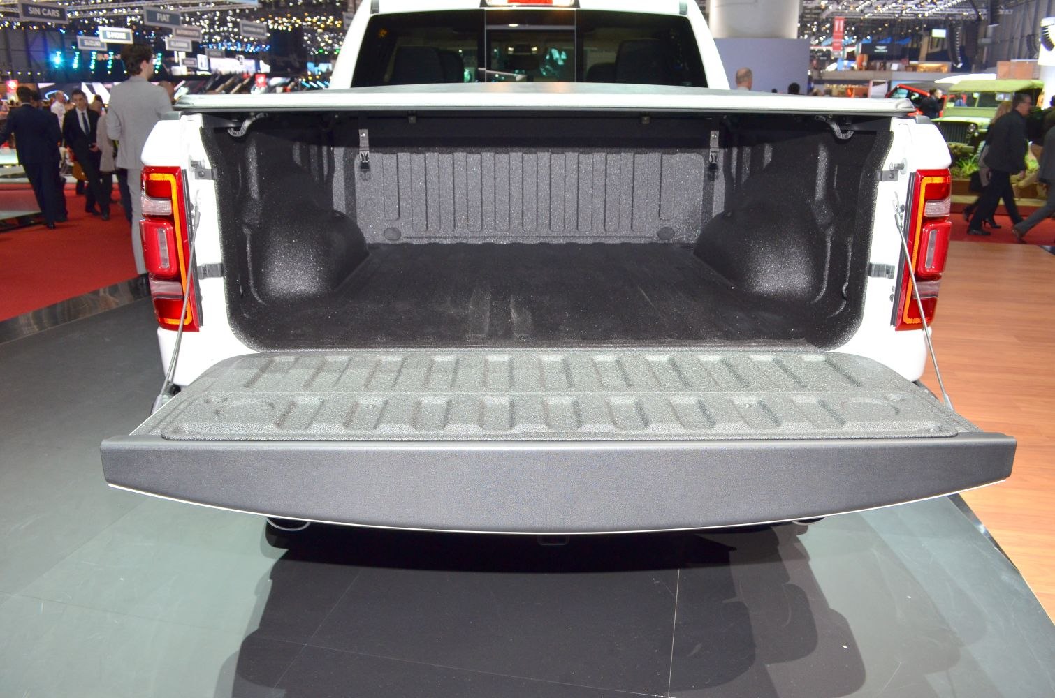 Spacious open pickup bed with textured lining and lowered tailgate