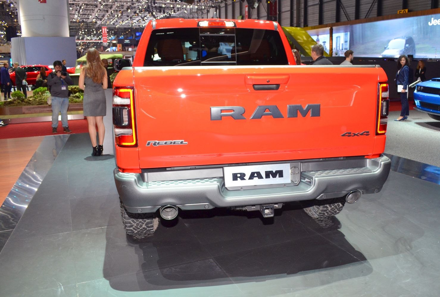 Rear view of pickup tailgate with RAM branding and 4x4 badge