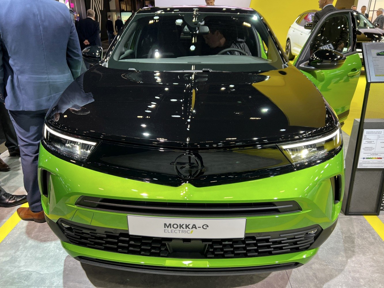 Electric compact SUV front with black hood and LED headlights