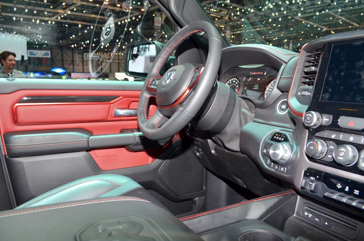 Steering wheel, dashboard, and infotainment center of a premium truck interior