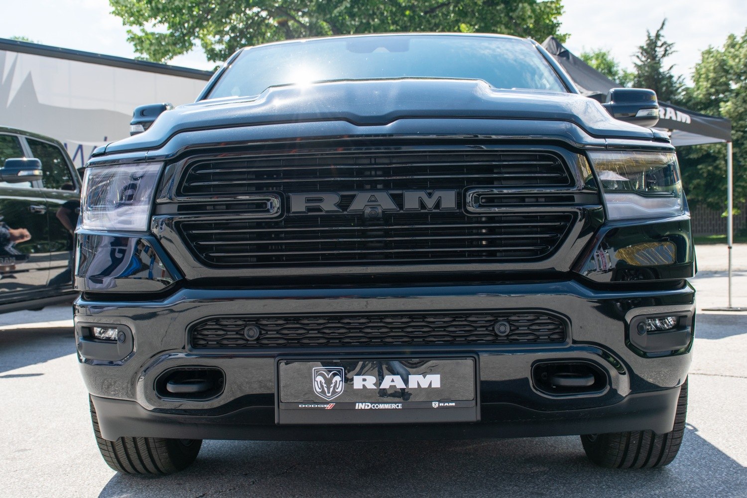 Front view with bold black grille and sleek headlights