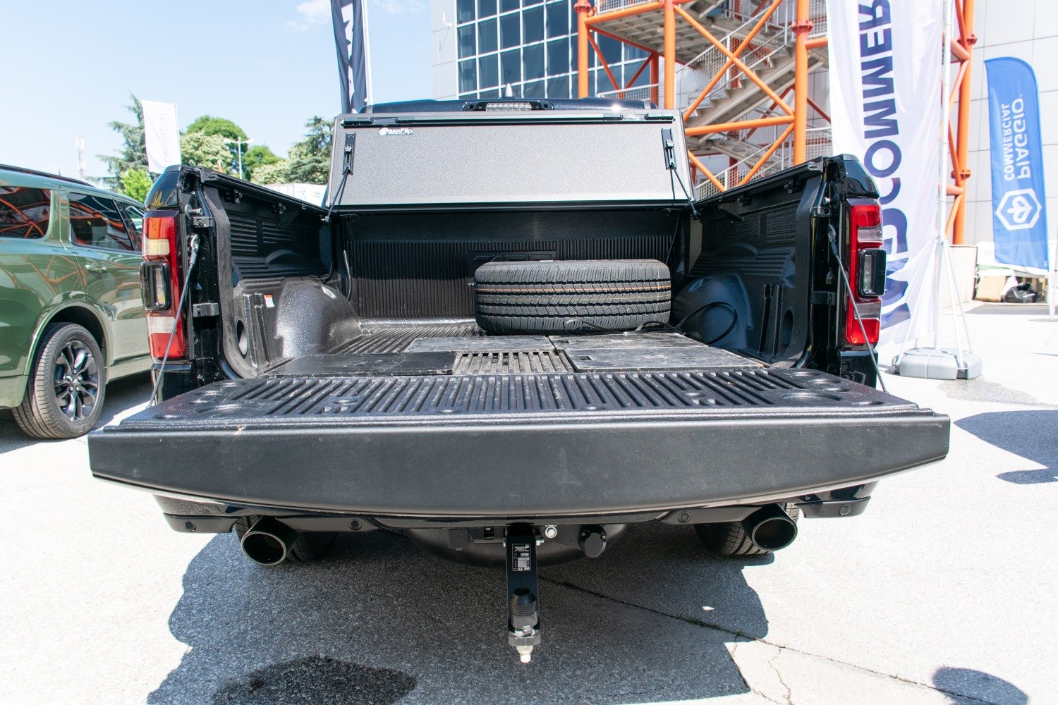 Open truck bed with spare tire and a protective bed liner