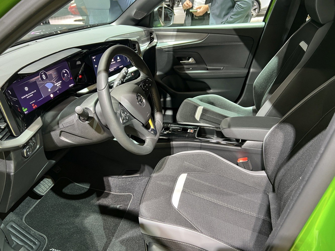 Digital dashboard and ergonomic front seats with lounge-style design