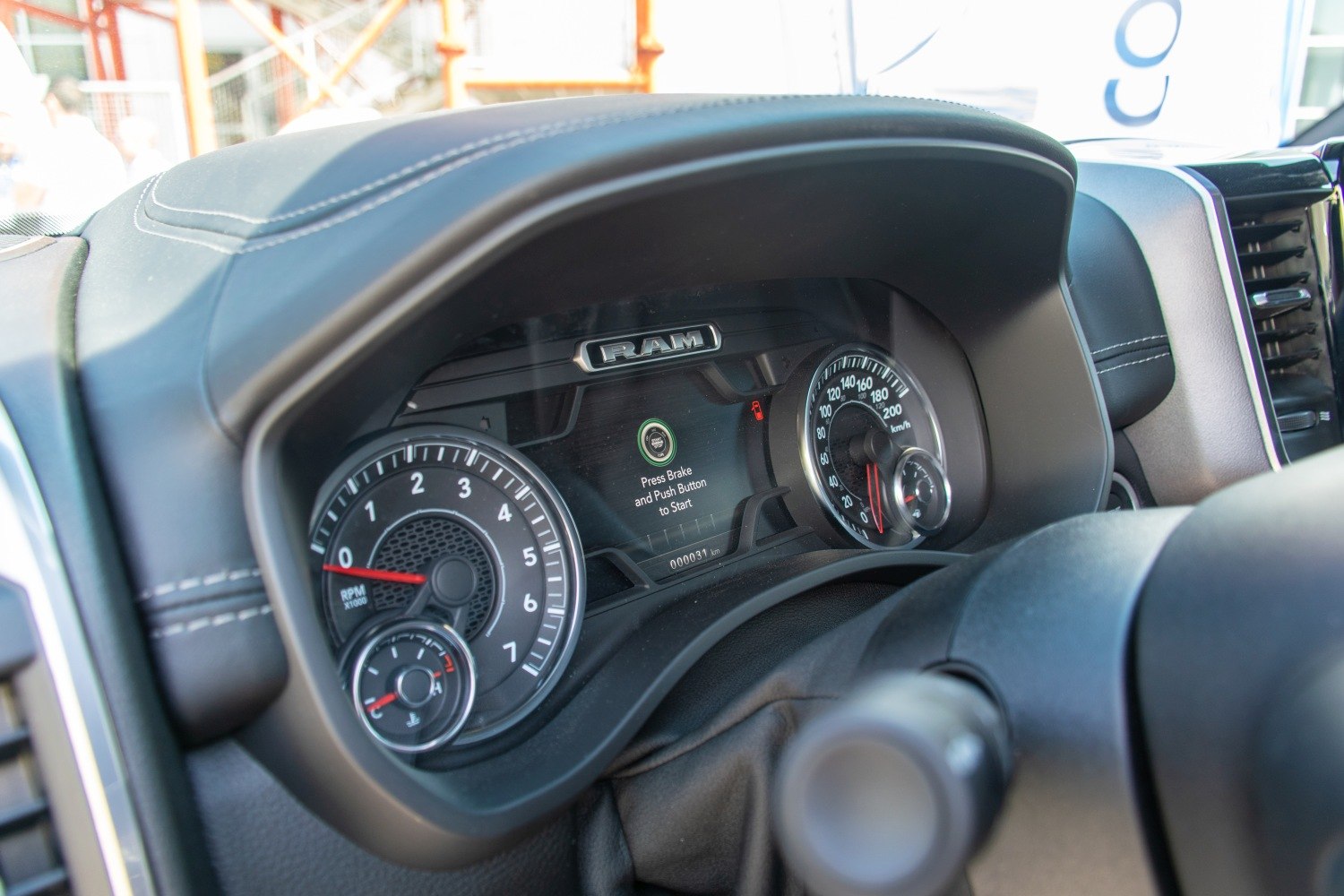 Digital instrument cluster with RPM and speedometer dials