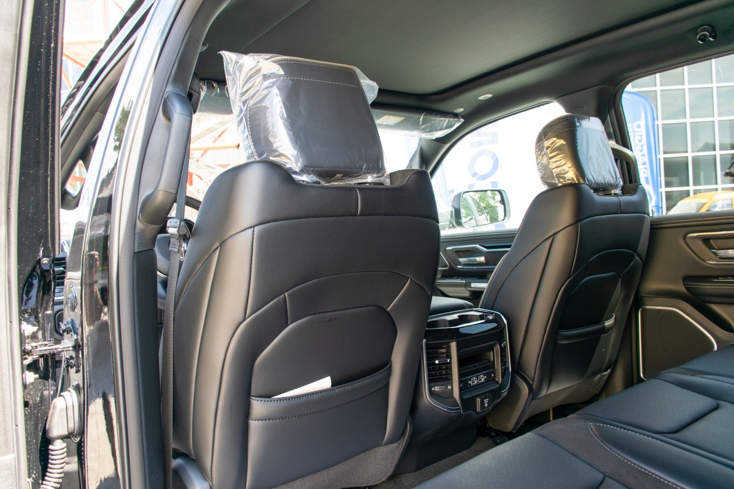 Black leather rear seats and center console with vents and USB ports