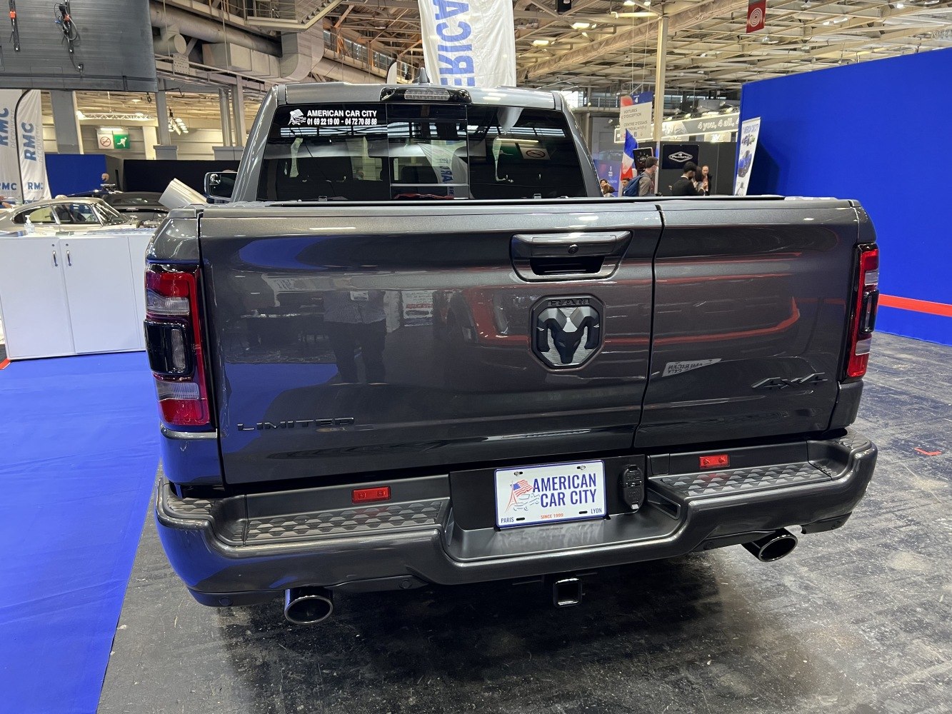 Rear tailgate and dual exhaust tips of pickup truck