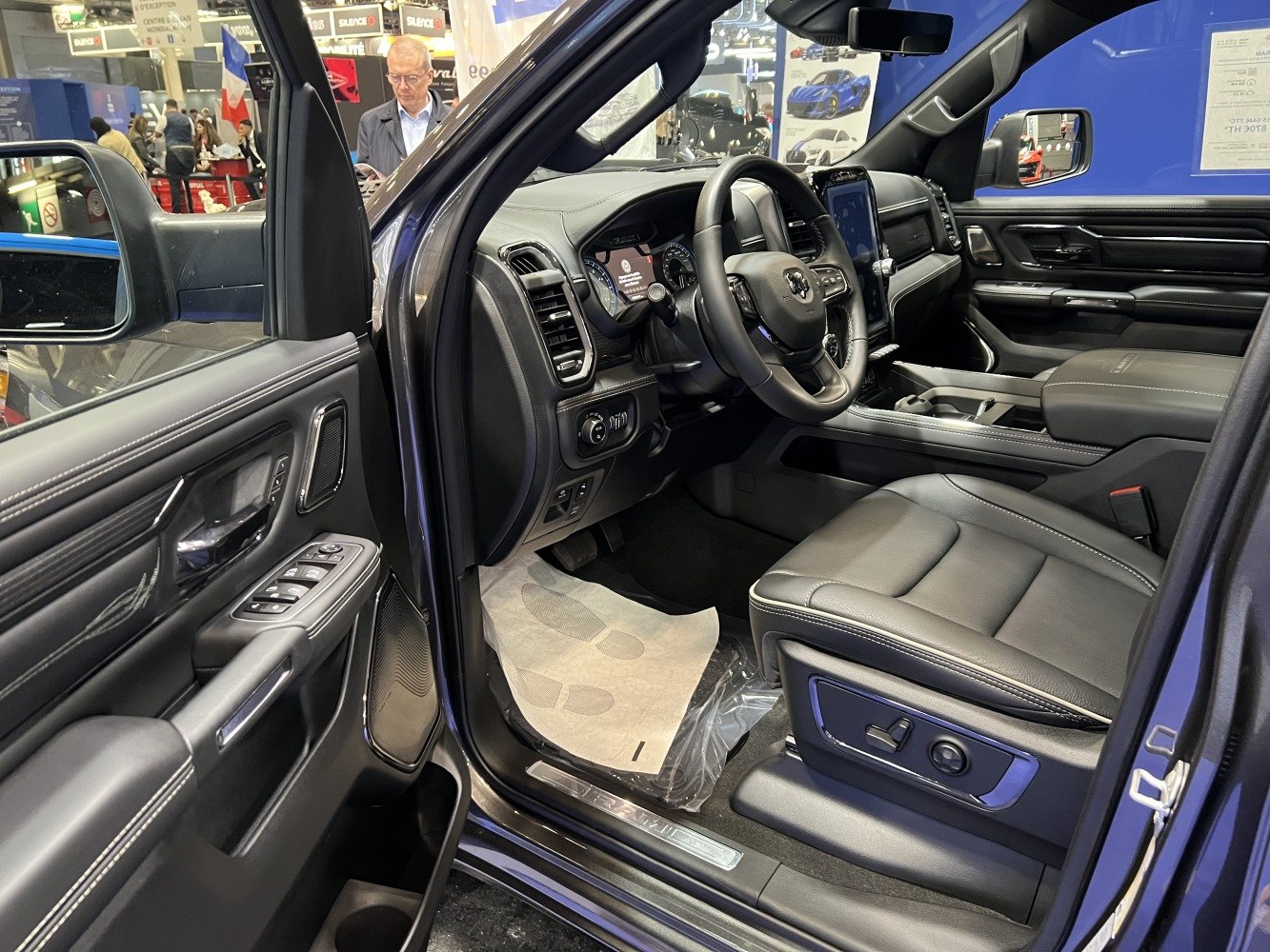 Modern truck interior with leather seating and advanced controls