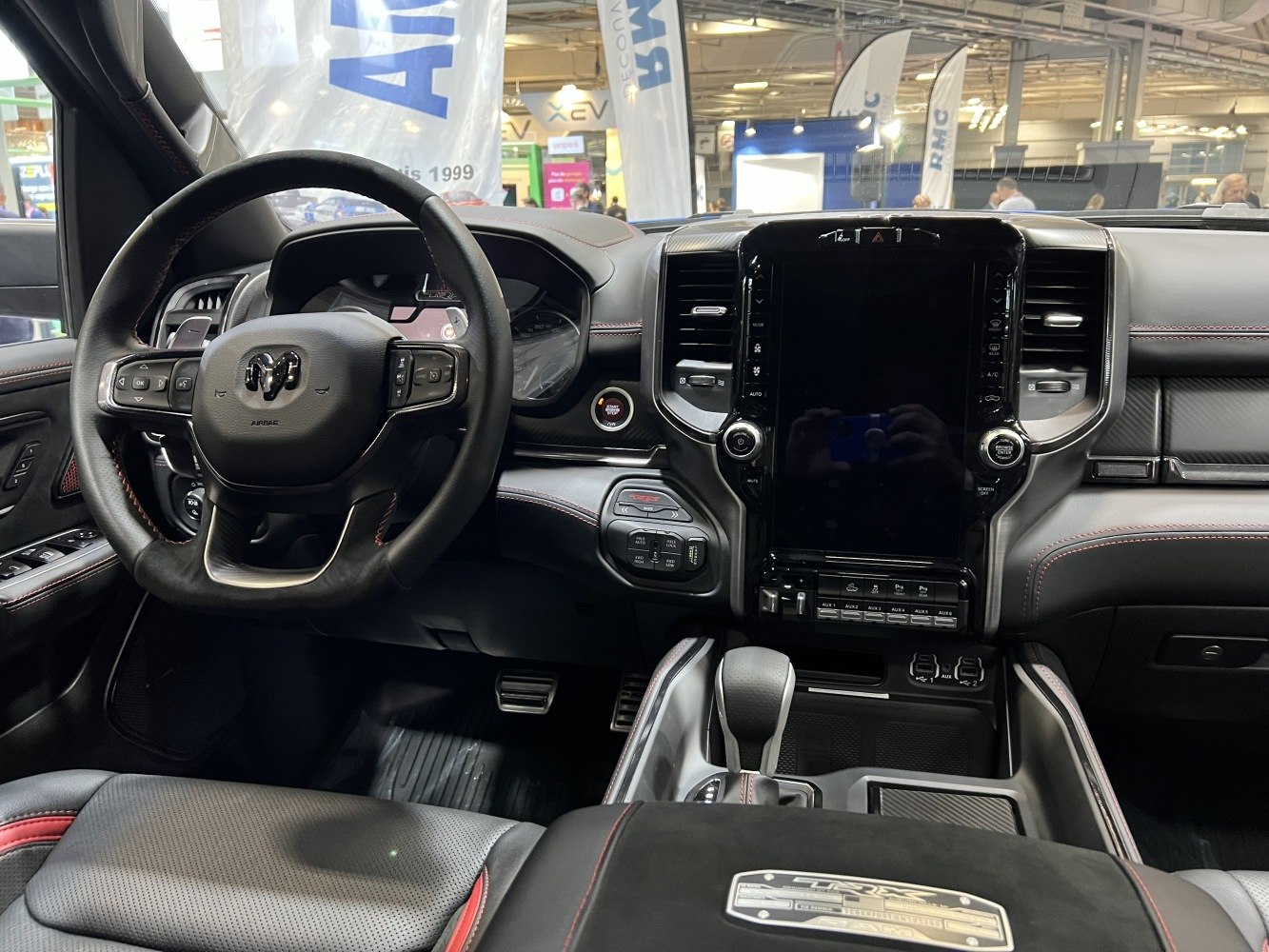 Truck dashboard and steering wheel with large touchscreen center display