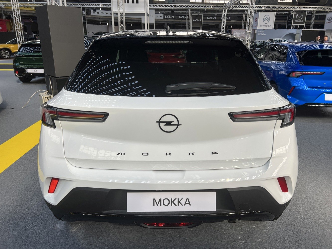 Rear view with modern taillights and smooth rear design.