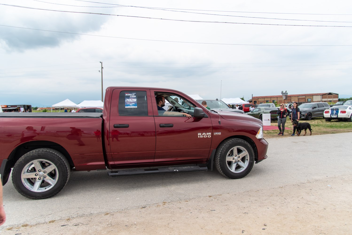 Side profile of pickup with alloy wheels and running boards