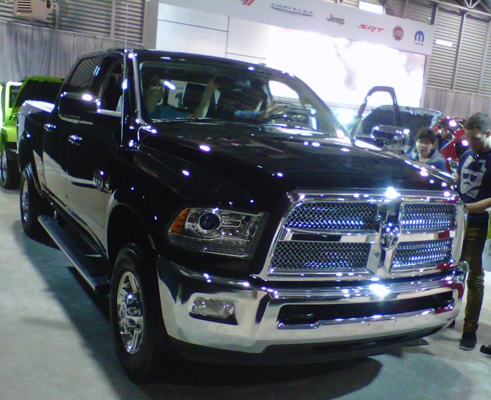 Front view of a heavy-duty pickup with chrome grille and dual headlights