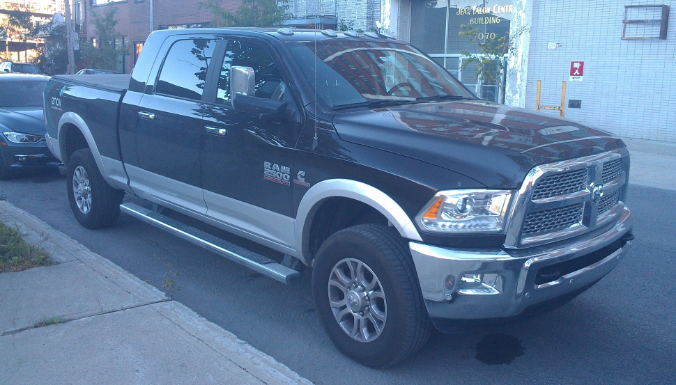 Heavy-duty pickup truck front and side view with crew cab and chrome accents