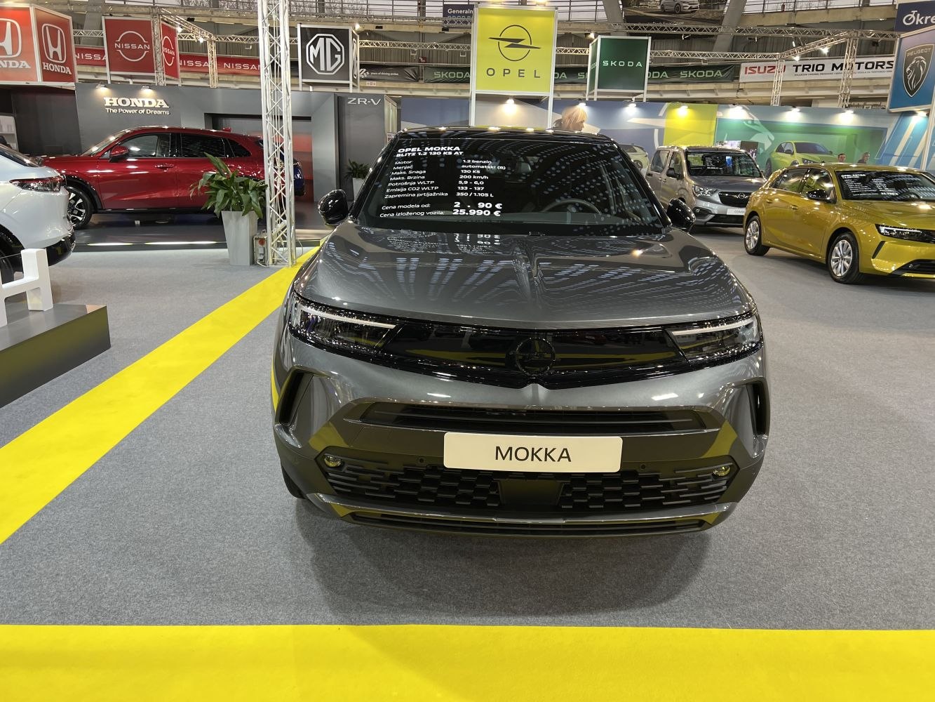 Front view of modern SUV with LED headlights and distinctive grille