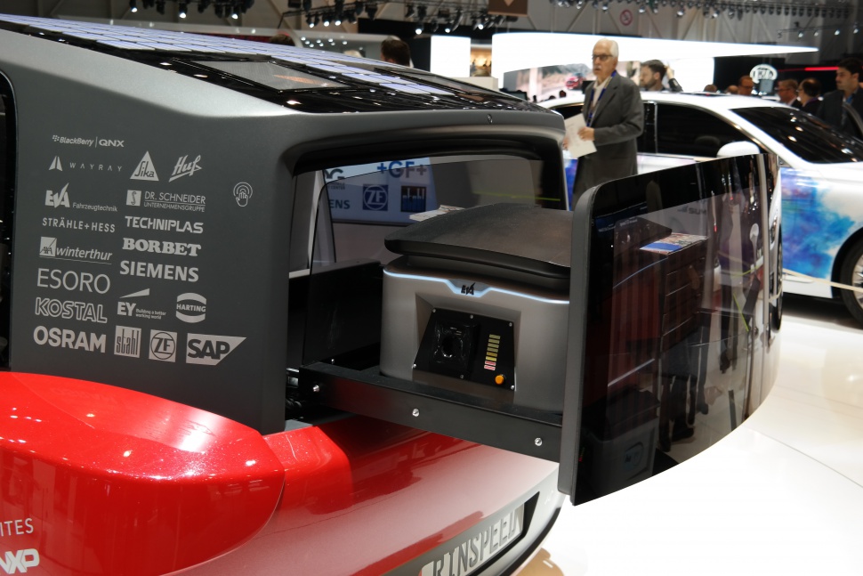 Rear compartment with smart storage and solar roof