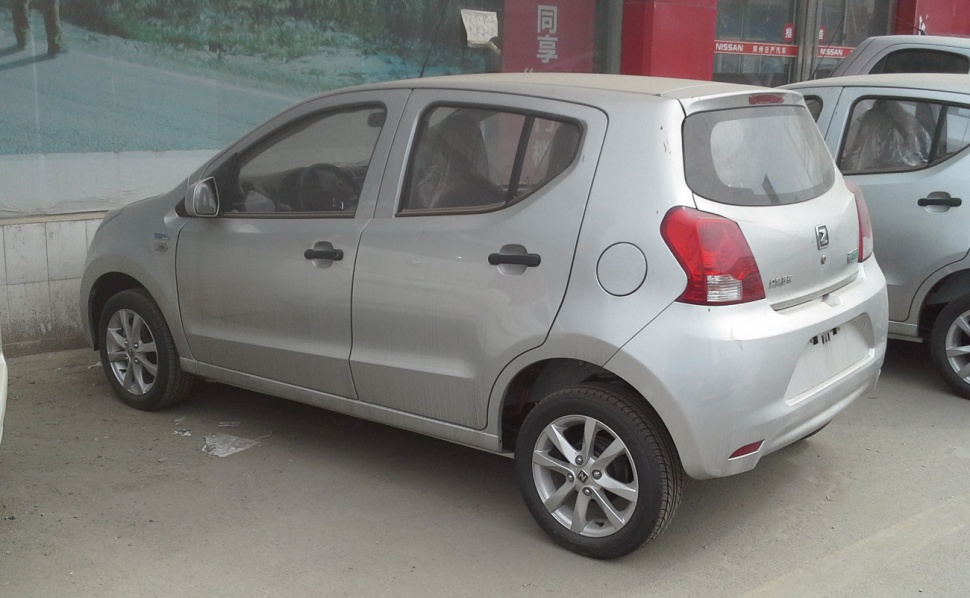 Rear side view of compact hatchback with alloy wheels and five-door design