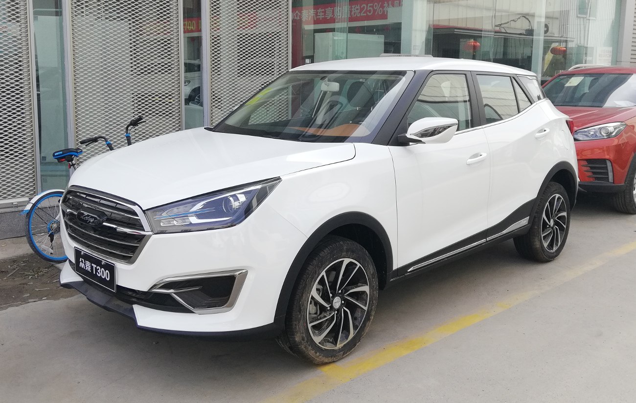 White compact SUV with LED headlights and sporty alloy wheels