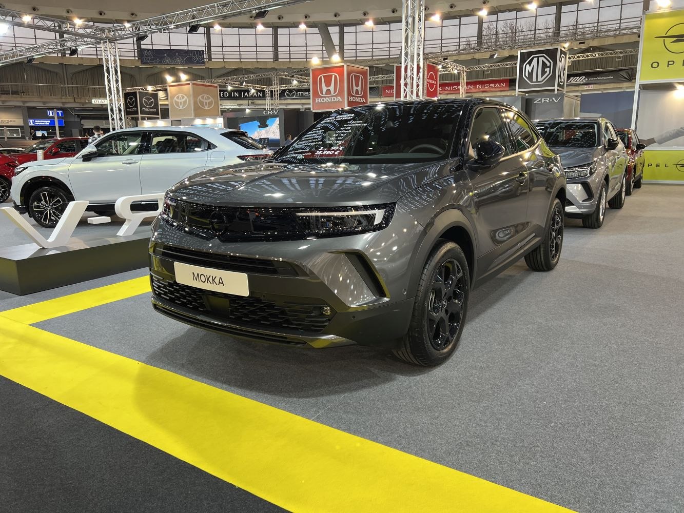 Compact SUV with black front grille and alloy wheels