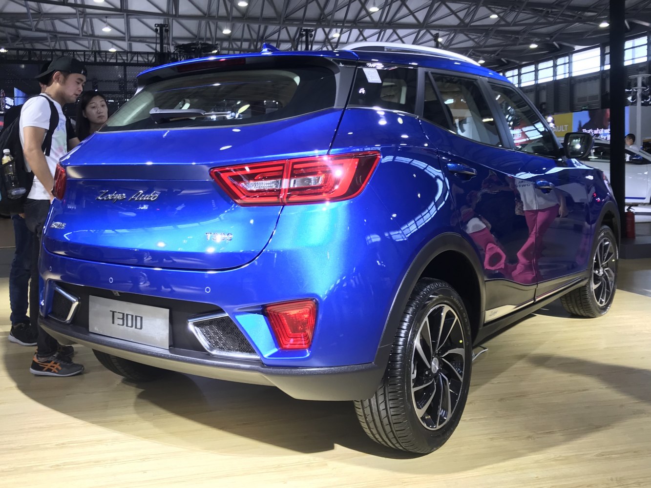 Rear view of a compact SUV with distinct taillights and alloy wheels