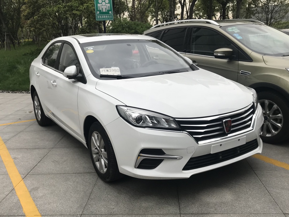 Front view with LED headlights and chrome grille