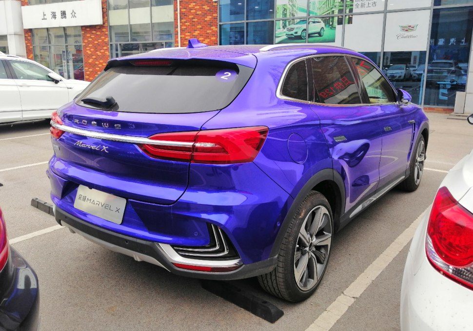 Rear and side view of a modern compact SUV with distinctive tail lights and alloy wheels