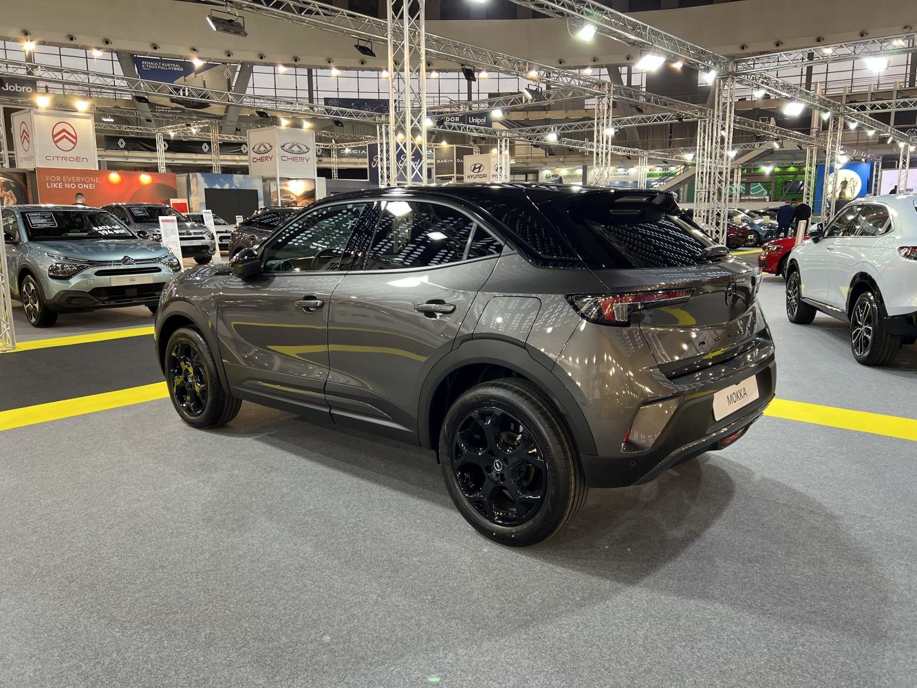 Compact SUV rear and side view with black alloy wheels and tinted windows