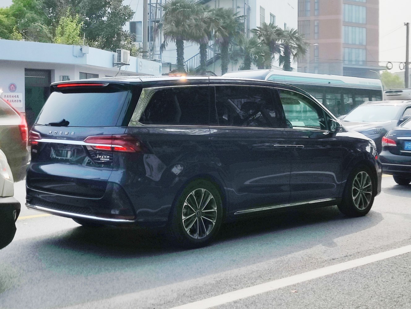 Large minivan with sleek rear design and LED tail lights
