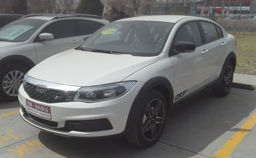Front side view with sporty grille and alloy wheels