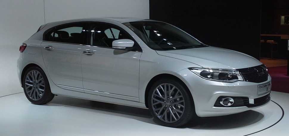 Sleek front and side profile with detailed headlights and alloy wheels