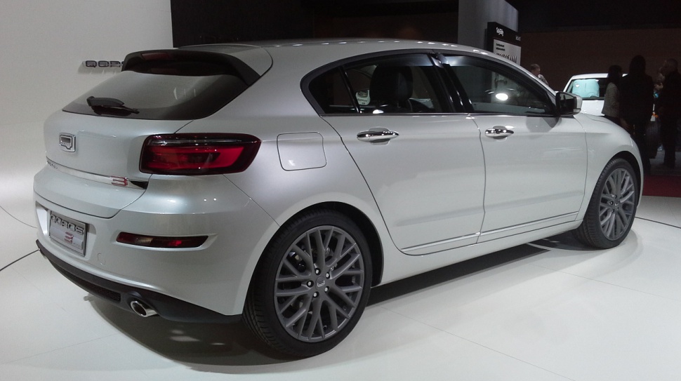 Rear side view of modern hatchback with alloy wheels and sporty details