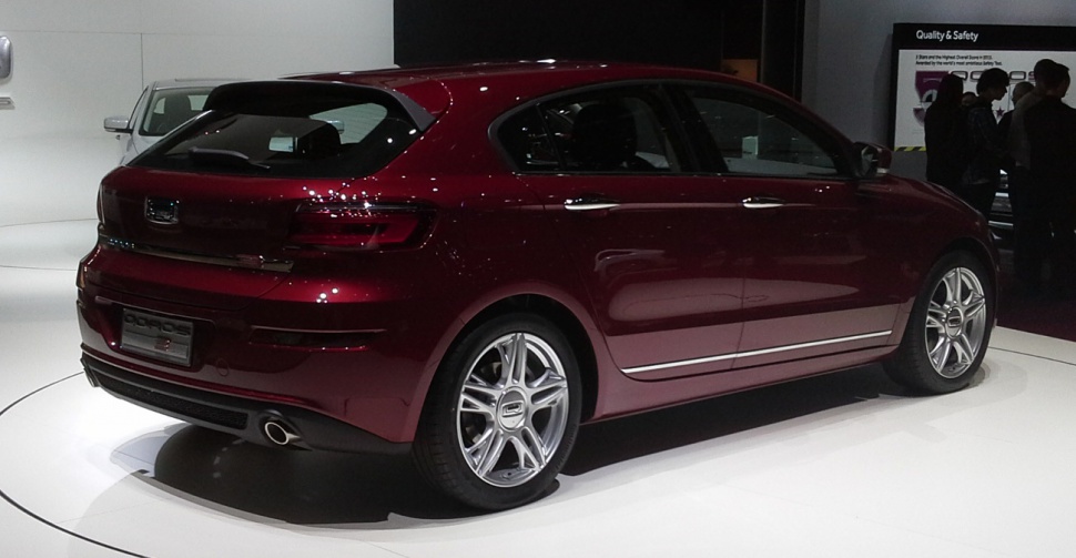 Rear view of hatchback with sleek tail lights and alloy wheels