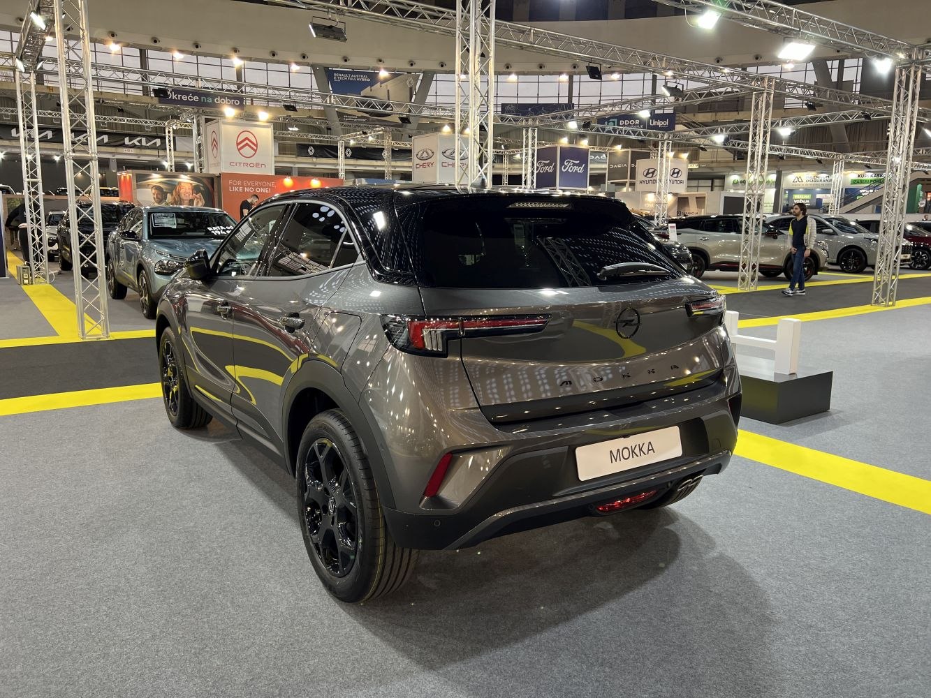 Rear view of a modern compact SUV with sleek taillights and tinted windows