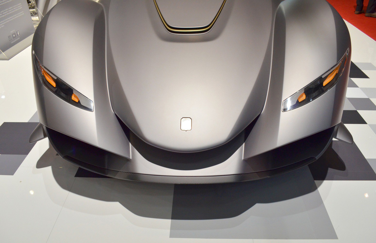 Sleek front hood with modern slim headlights and aerodynamic design