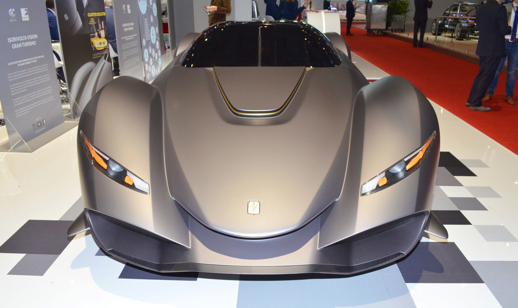 Front view with sharp headlights and aerodynamic hood