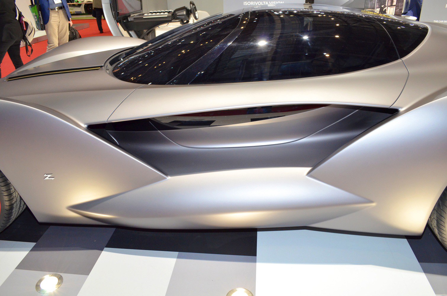 Sleek aerodynamic side profile with tinted windows and smooth contours