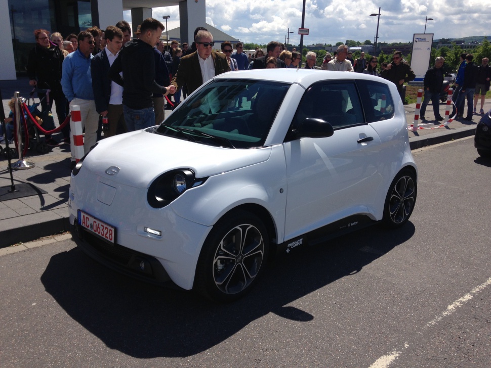 Compact electric car front three-quarter exterior view