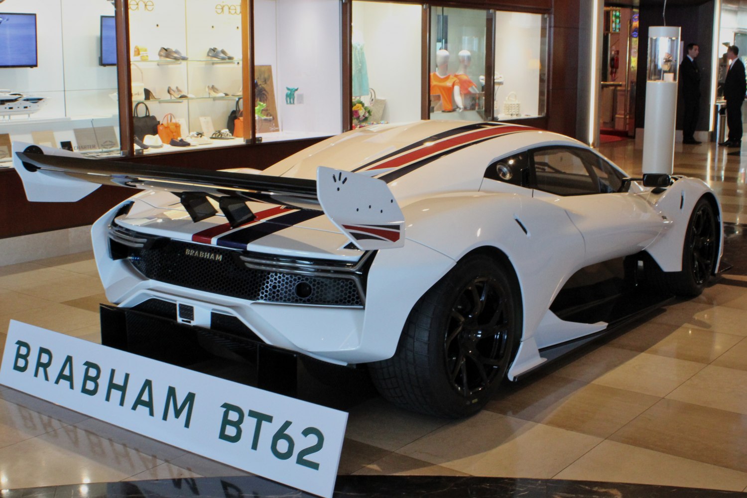 Aerodynamic rear with large racing wing and diffuser.