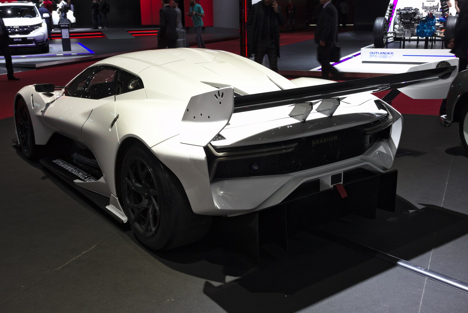 Aggressive rear wing and diffuser design on high-performance racing vehicle