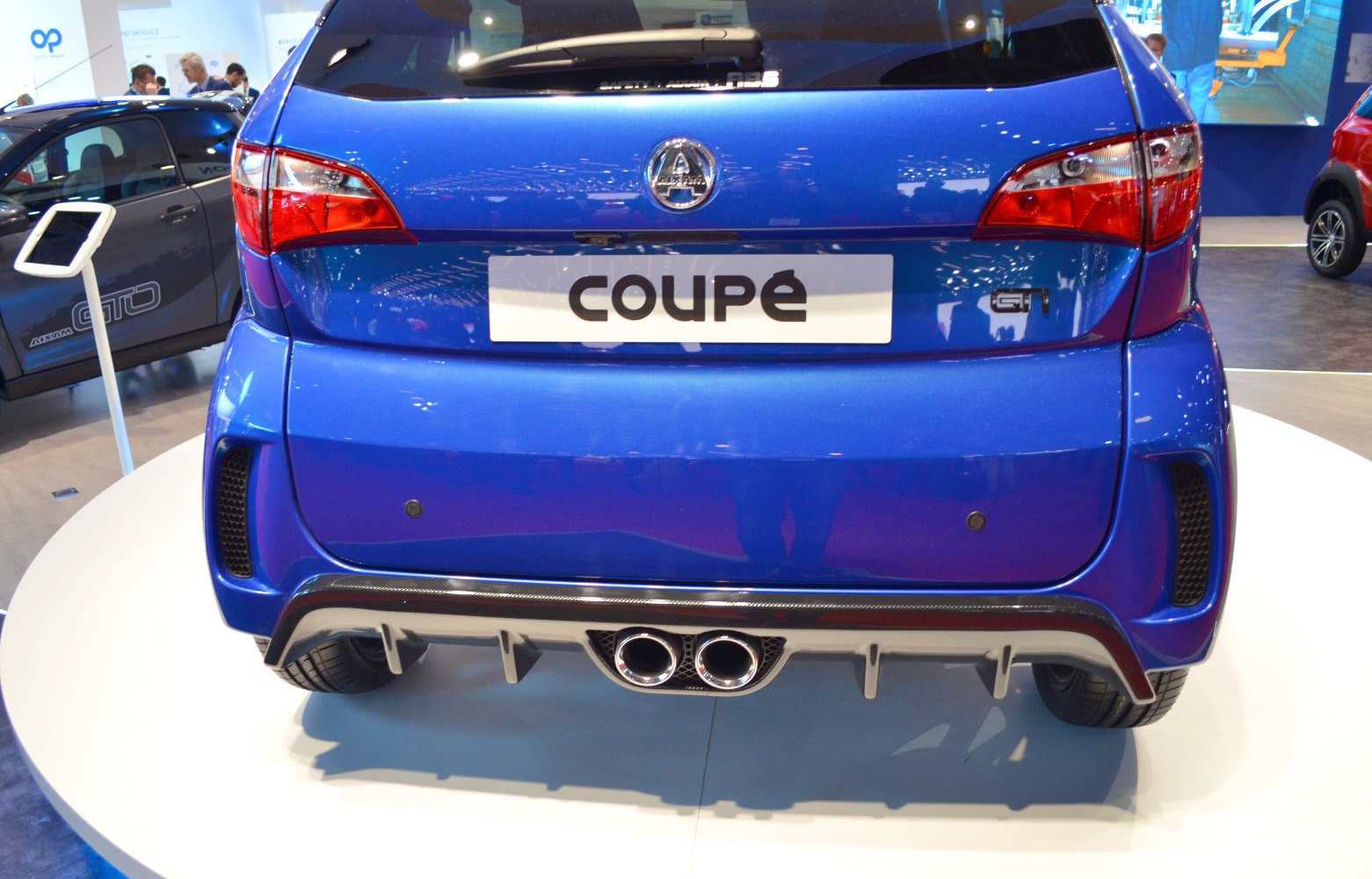 Rear view with taillights, diffuser, dual exhaust tips
