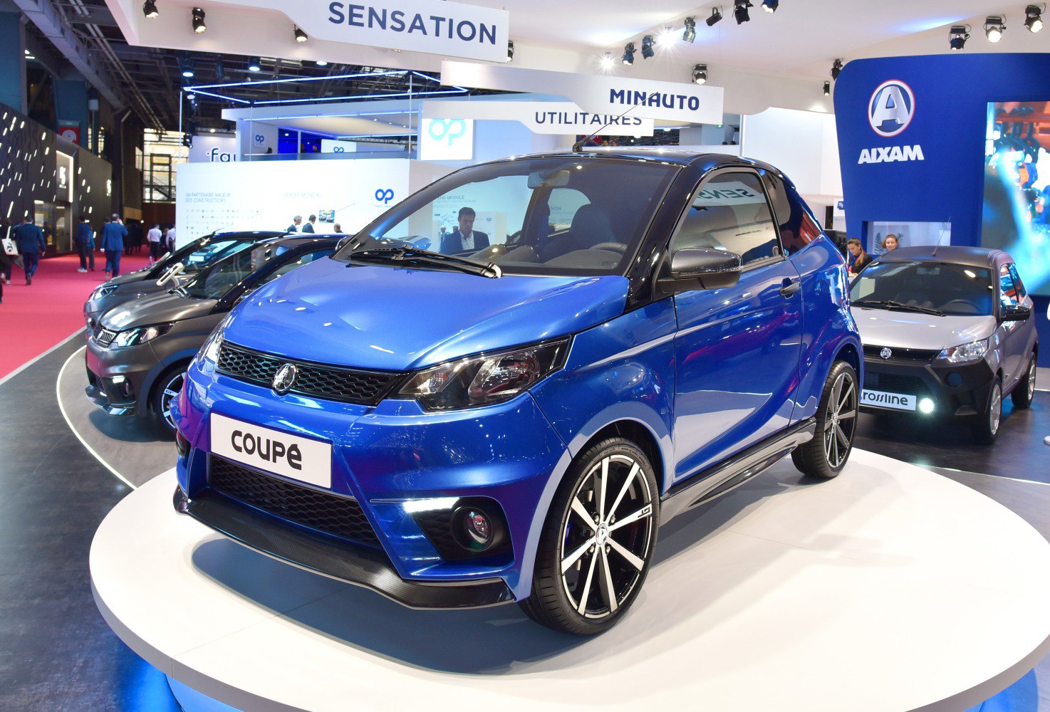 Compact coupe with sharp headlamps and sporty alloy wheels
