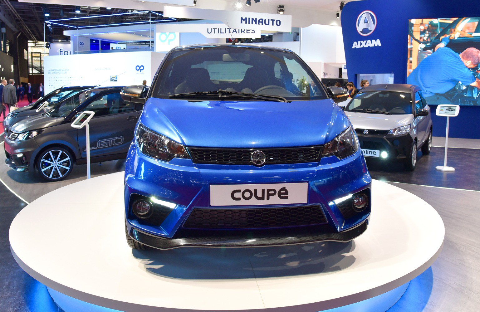 Front view showing grille and headlight design of compact coupe
