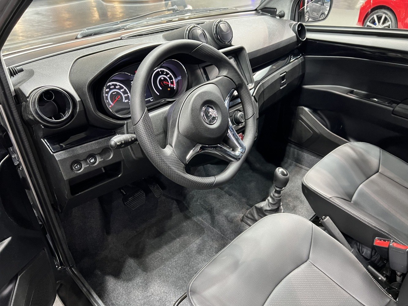 Dashboard, steering wheel, and gear shift of electric microcar interior
