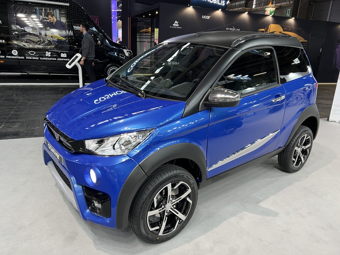 Front side view with headlights and alloy wheels