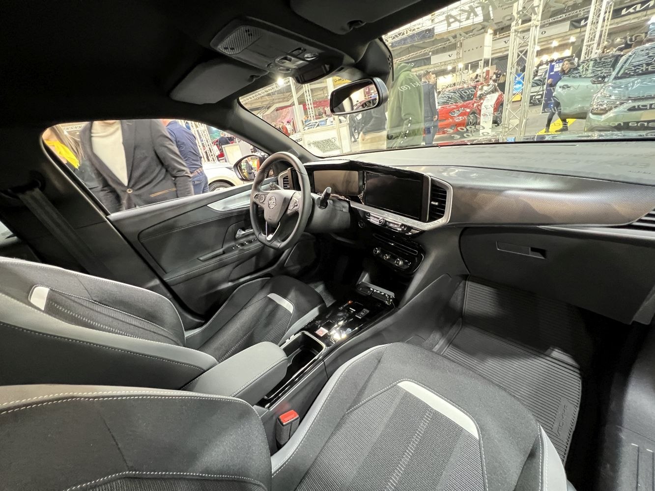 Interior dashboard, steering wheel, front seats upholstery