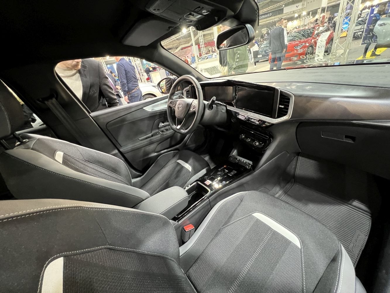 Spacious modern SUV interior with digital dashboard and center console.
