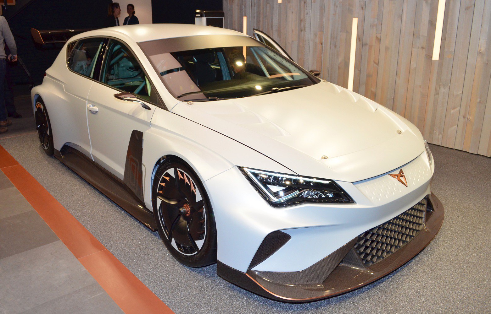 Aerodynamic electric racing car with aggressive front end and unique wheels