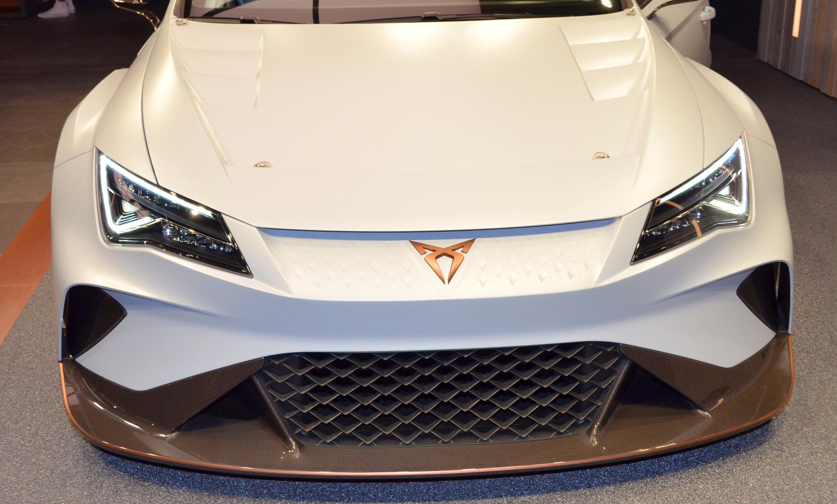 Sharp LED headlights, aerodynamic hood vents, and honeycomb grille