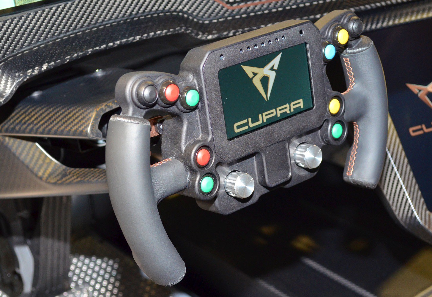 Racing steering wheel with digital display and multiple control buttons