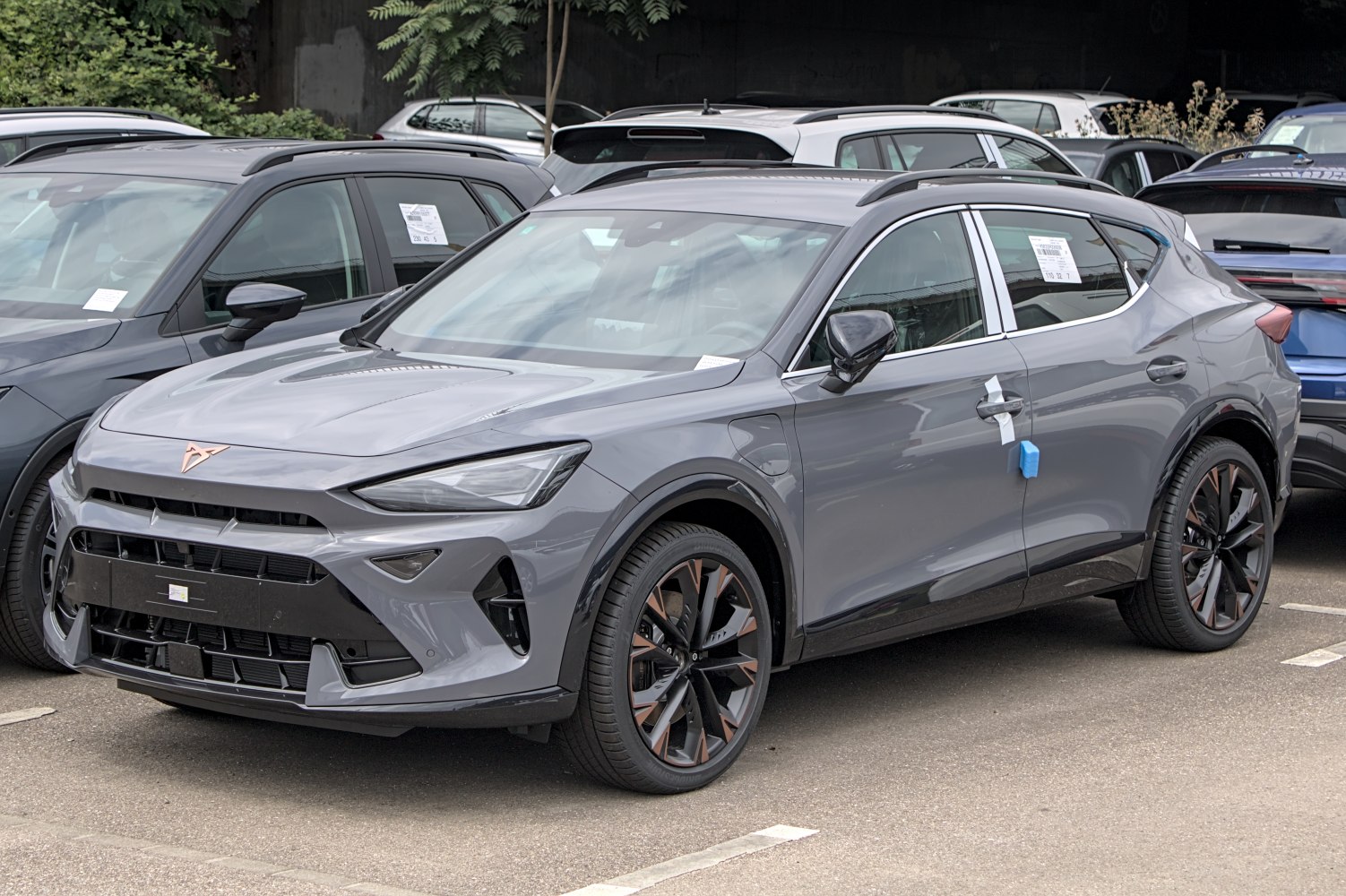 Sleek front grille with sharp LED headlights and distinct alloy wheels