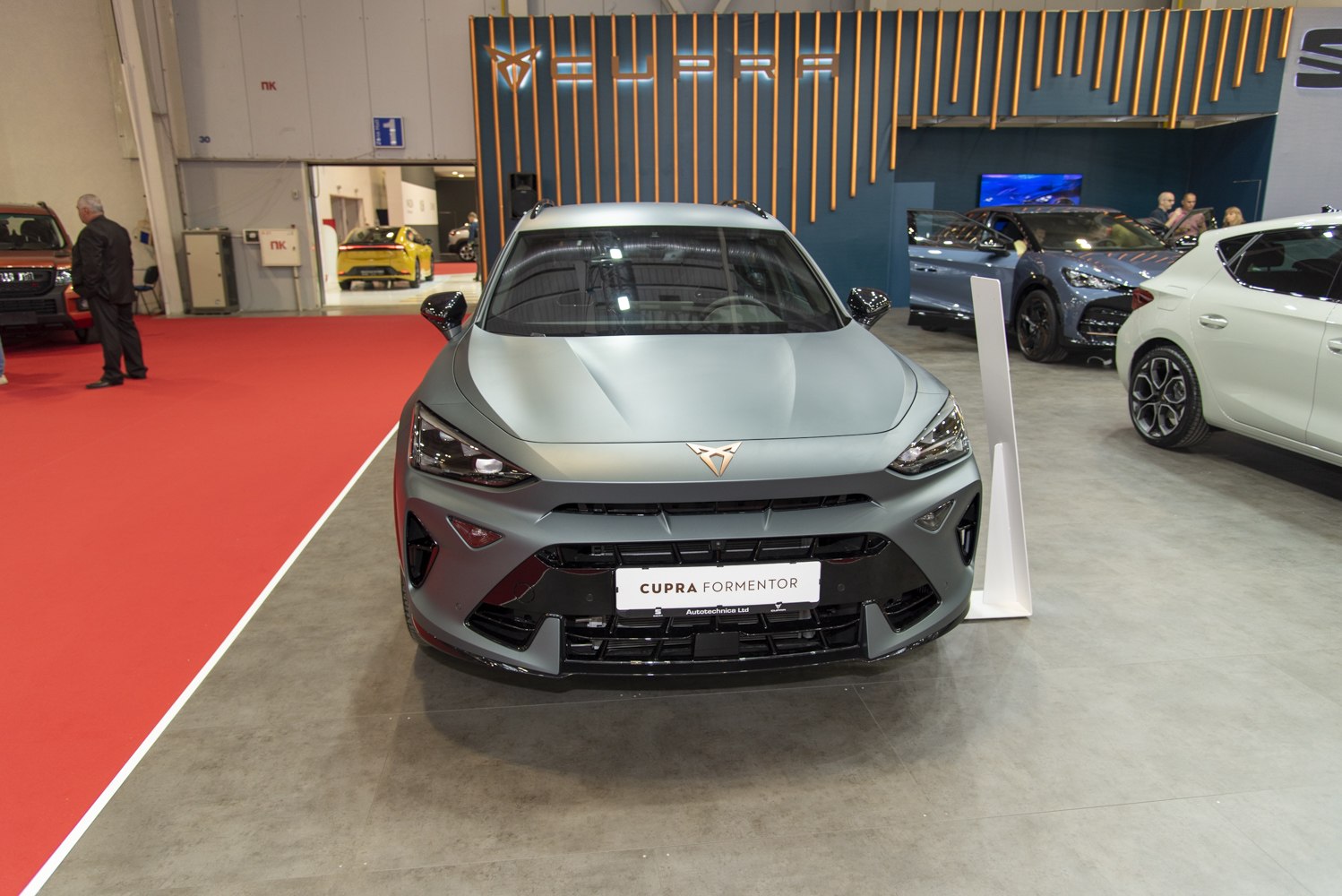 Aggressive front grille and sleek headlights with sporty bumper