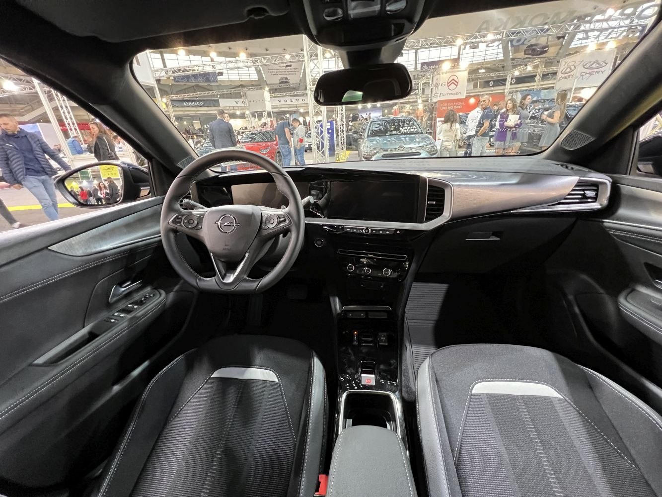 Modern digital dashboard and multi-function steering wheel with center console